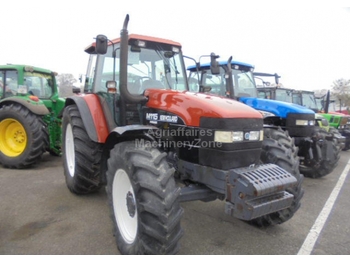 Traktor New Holland M115: das Bild 1