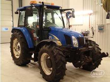 Traktor New Holland TL90A Traktor (frontlyft): das Bild 1