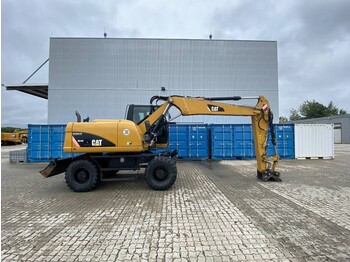 Mobilbagger Caterpillar M 313 D: das Bild 1