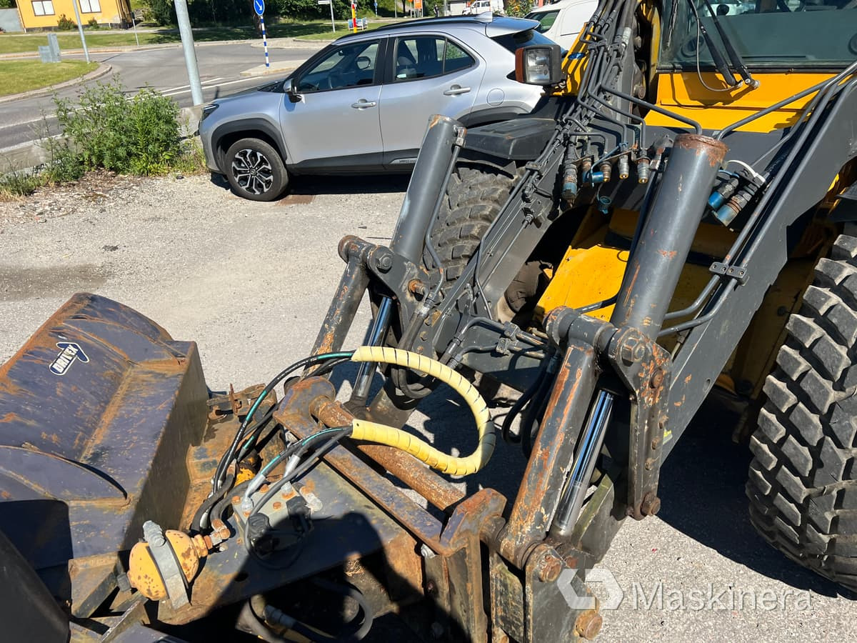 Radlader Redskapsbärare Wille 655 med vikplog