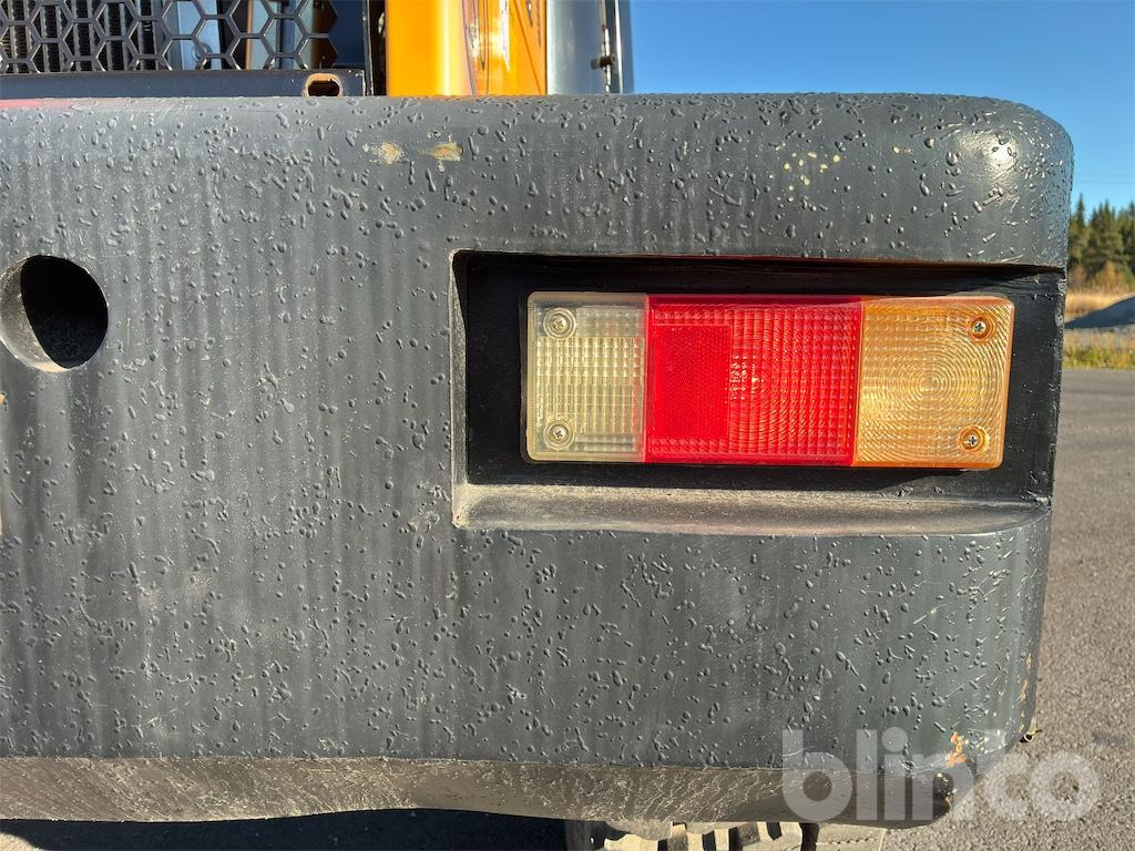 Radlader Swekip 2050 inklusive långgafflar och planeringsskopa