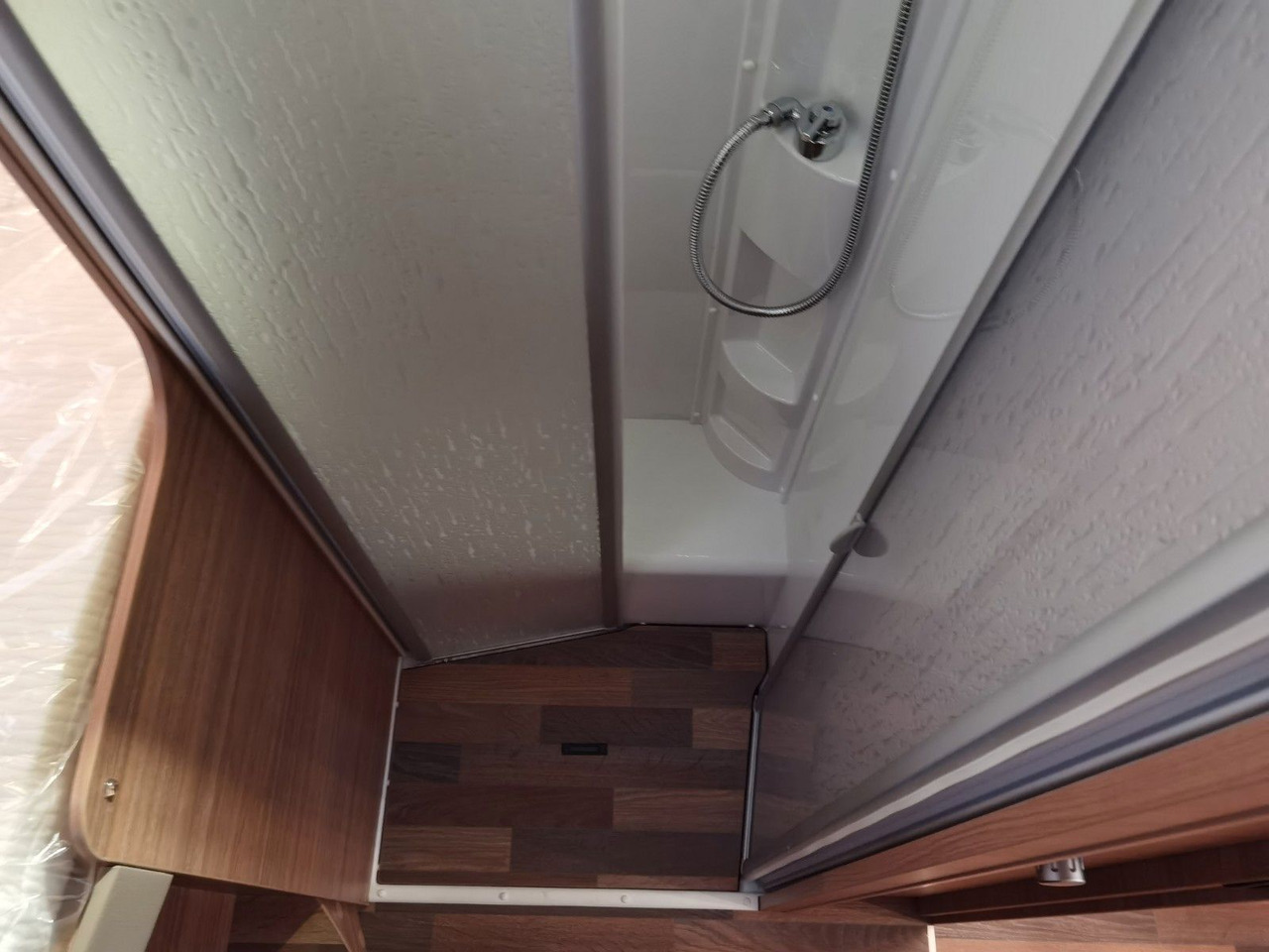 Teilintegriertes Wohnmobil Weinsberg CARASUITE 650 MG / 140PS / HECKBETT & HUBBETT