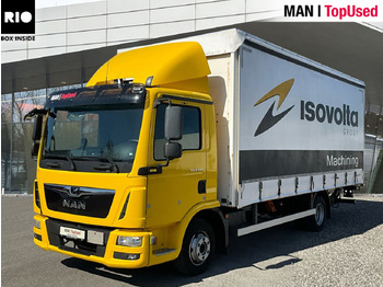 MAN Transporter mit Plane