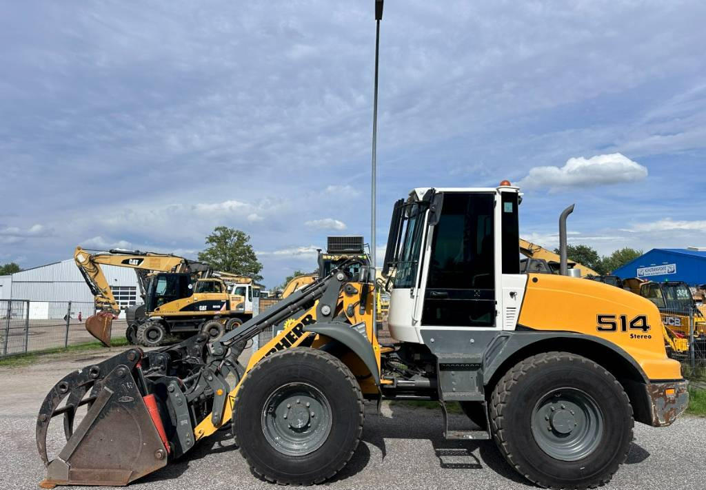 Liebherr L 514 Stereo +30 Kmh Klima 3er Kreis Greifschaufel - Radlader: das Bild 1 Liebherr L 514 Stereo +30 Kmh Klima 3er Kreis Greifschaufel - Radlader: das Bild 1