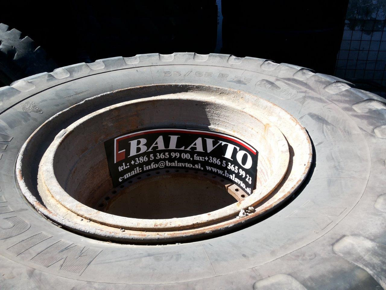 Caterpillar 988B - Komplettrad für Baumaschine: das Bild 1 Caterpillar 988B - Komplettrad für Baumaschine: das Bild 1