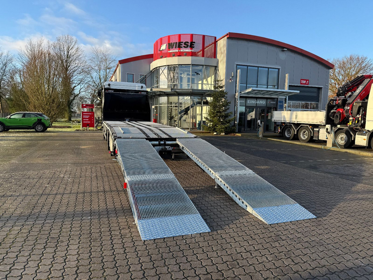 MAN Baumaschinen- Arbeitsbühnentransporter Rampen - Autotransporter LKW: das Bild 4 MAN Baumaschinen- Arbeitsbühnentransporter Rampen - Autotransporter LKW: das Bild 4