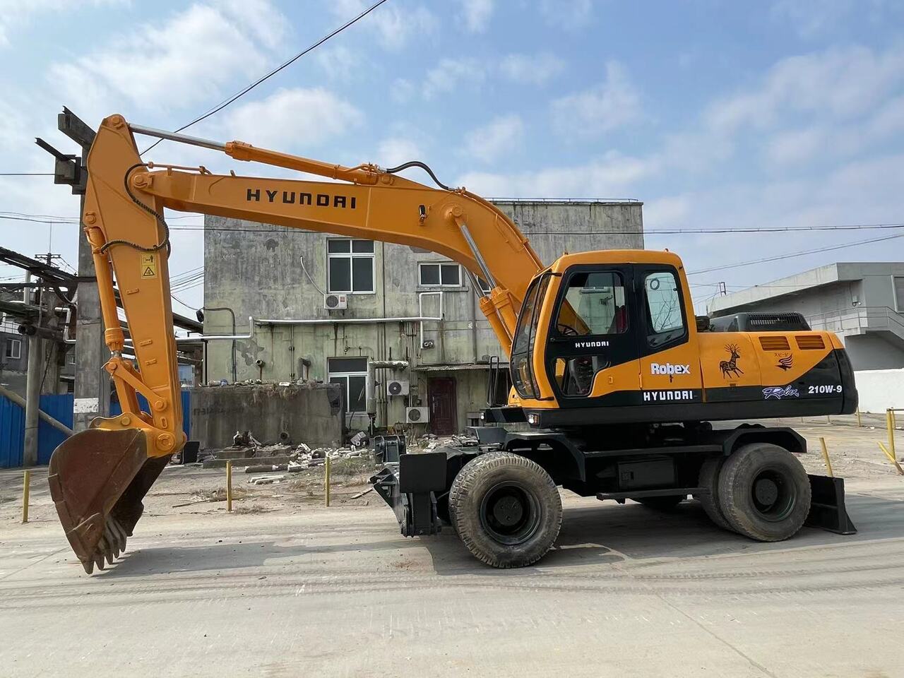HYUNDAI 210W-9 - Mobilbagger: das Bild 1 HYUNDAI 210W-9 - Mobilbagger: das Bild 1