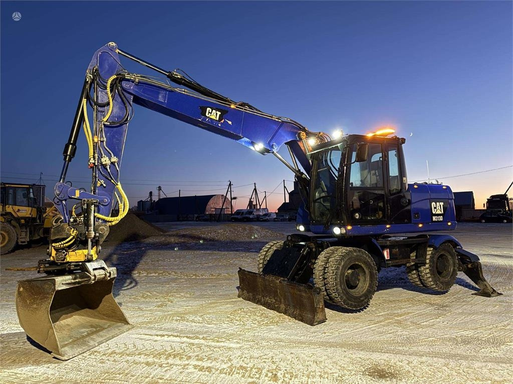 CAT M 313 D Rototilt + Grapple - Mobilbagger: das Bild 1 CAT M 313 D Rototilt + Grapple - Mobilbagger: das Bild 1