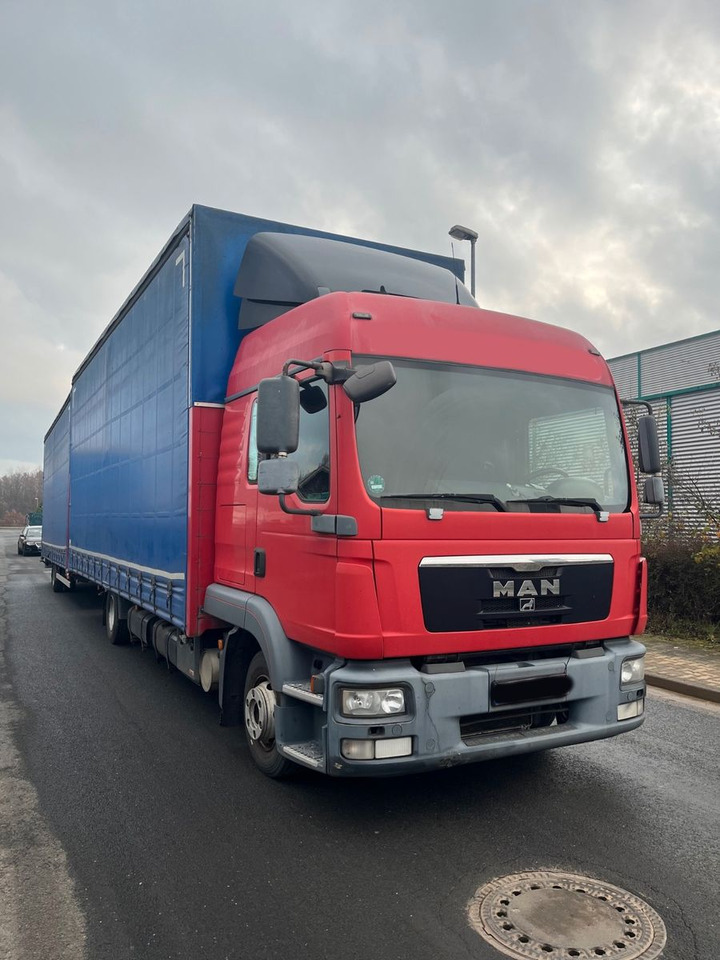 MAN 8.220 4X2 Pritschenwagen - Plane LKW: das Bild 2 MAN 8.220 4X2 Pritschenwagen - Plane LKW: das Bild 2