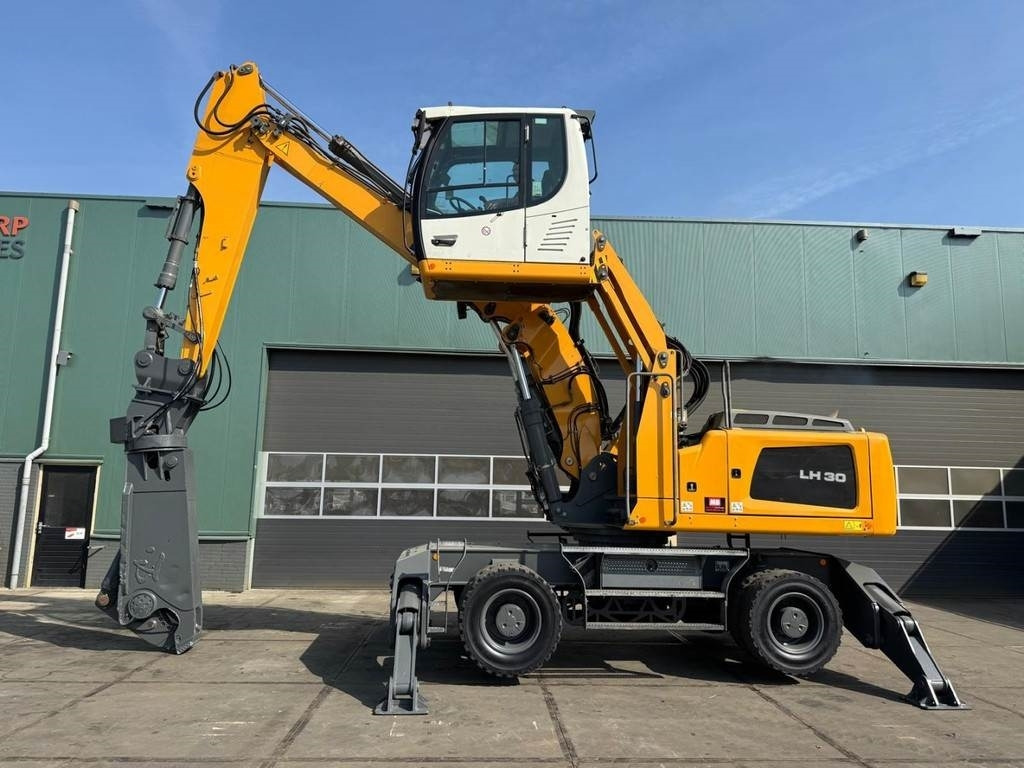 Liebherr LH 30 M - Umschlagbagger: das Bild 1 Liebherr LH 30 M - Umschlagbagger: das Bild 1