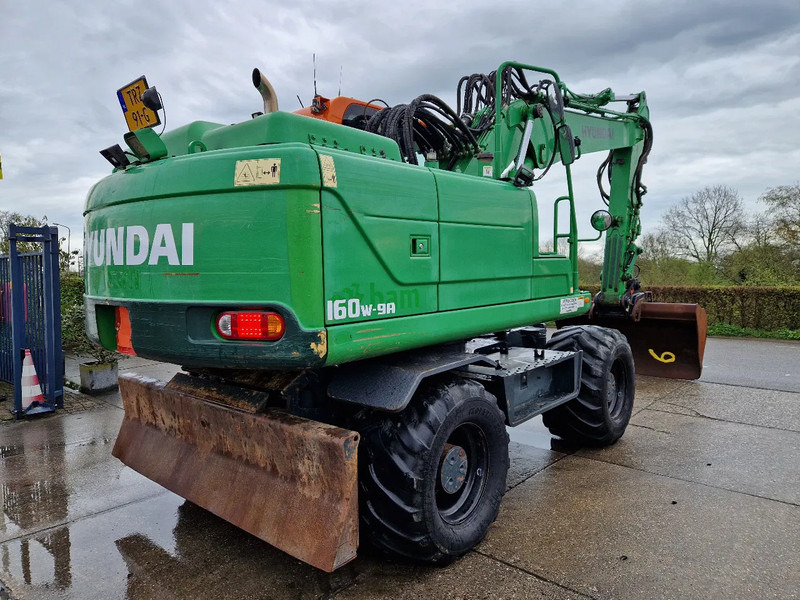 Hyundai Robex 160W-9A met 6-cilinder Cummins motor - Mobilbagger: das Bild 4 Hyundai Robex 160W-9A met 6-cilinder Cummins motor - Mobilbagger: das Bild 4