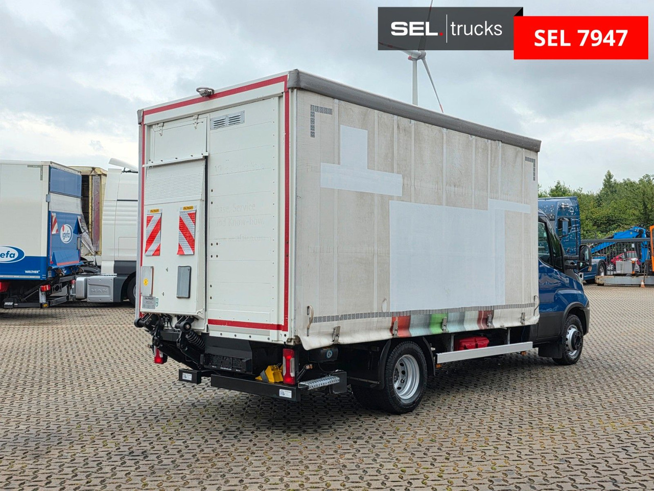 Iveco Daily 70C18 Hi-Matic / Ladebordwand / 3 Sitzen - Transporter mit Plane: das Bild 5 Iveco Daily 70C18 Hi-Matic / Ladebordwand / 3 Sitzen - Transporter mit Plane: das Bild 5