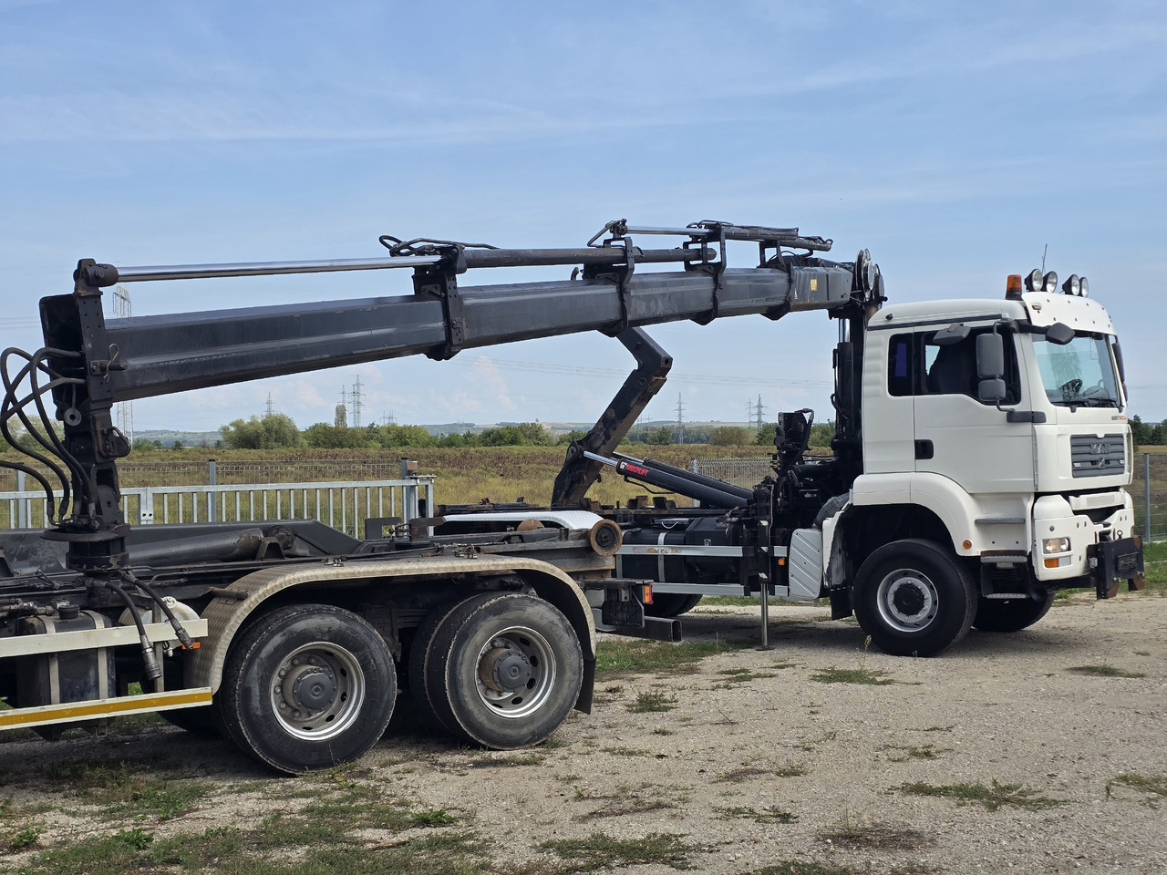 MAN TGA 26.440 6X6 / HOOK SYSTEM / HIAB 166D REMOTE SPECIAL PRICE ONLY THIS YEAR - Abrollkipper, Autokran: das Bild 4 MAN TGA 26.440 6X6 / HOOK SYSTEM / HIAB 166D REMOTE SPECIAL PRICE ONLY THIS YEAR - Abrollkipper, Autokran: das Bild 4