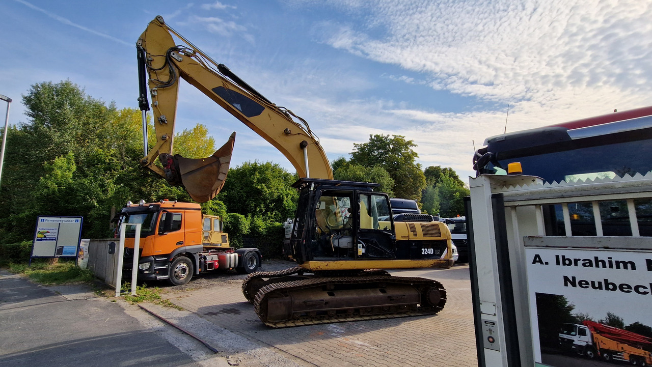 CAT 324 D Deutsche Maschine | Schnellwechsler | Löffel | Hammerhydraulik | 8016h original - Kettenbagger: das Bild 1 CAT 324 D Deutsche Maschine | Schnellwechsler | Löffel | Hammerhydraulik | 8016h original - Kettenbagger: das Bild 1