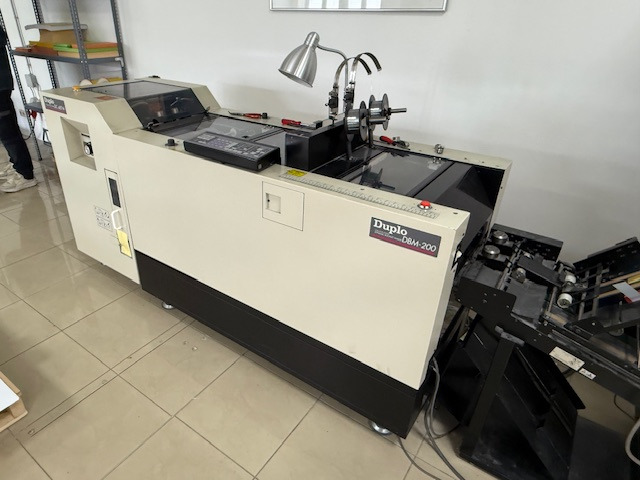 Duplo DC 10000 S - Druckmaschine: das Bild 2 Duplo DC 10000 S - Druckmaschine: das Bild 2