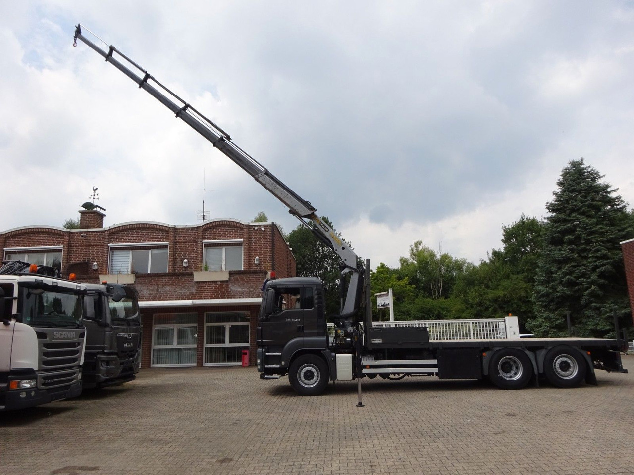 MAN 26.360 TGS Pritsche + PK 16502 Kran 6x2 - Autokran: das Bild 1 MAN 26.360 TGS Pritsche + PK 16502 Kran 6x2 - Autokran: das Bild 1