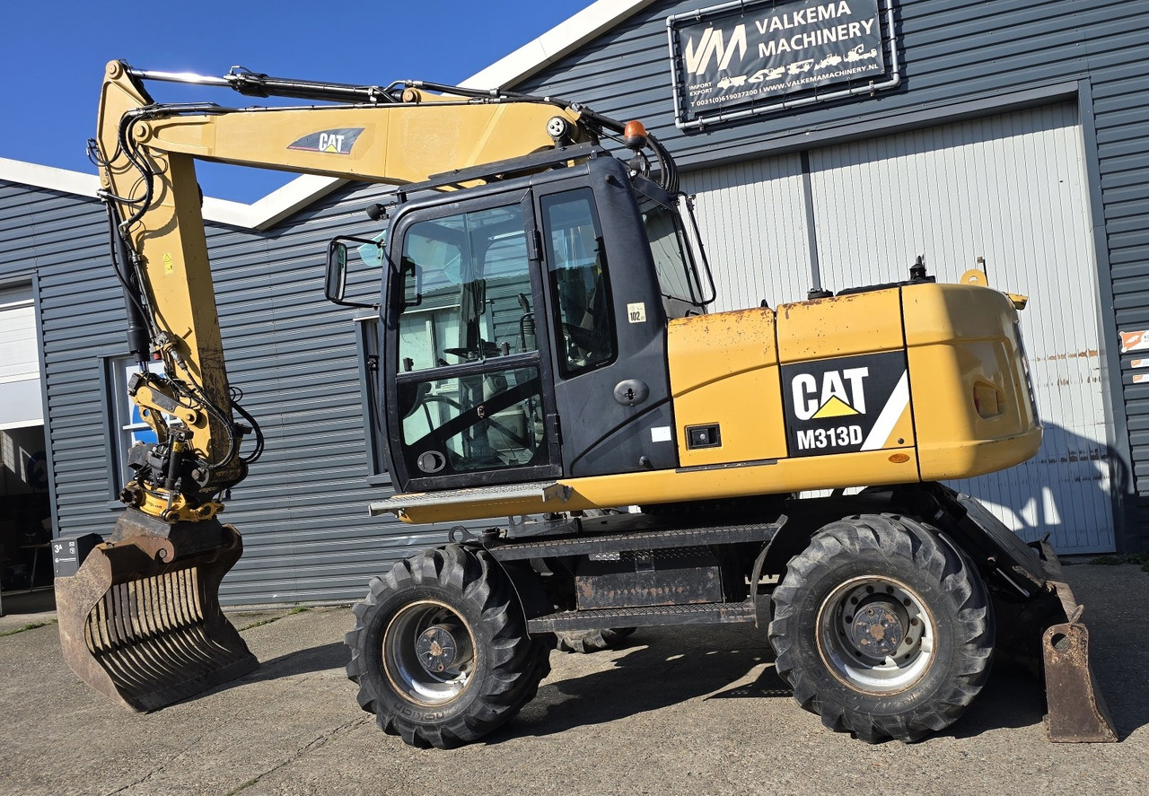 Mobilbagger CATERPILLAR M313D: das Bild 8