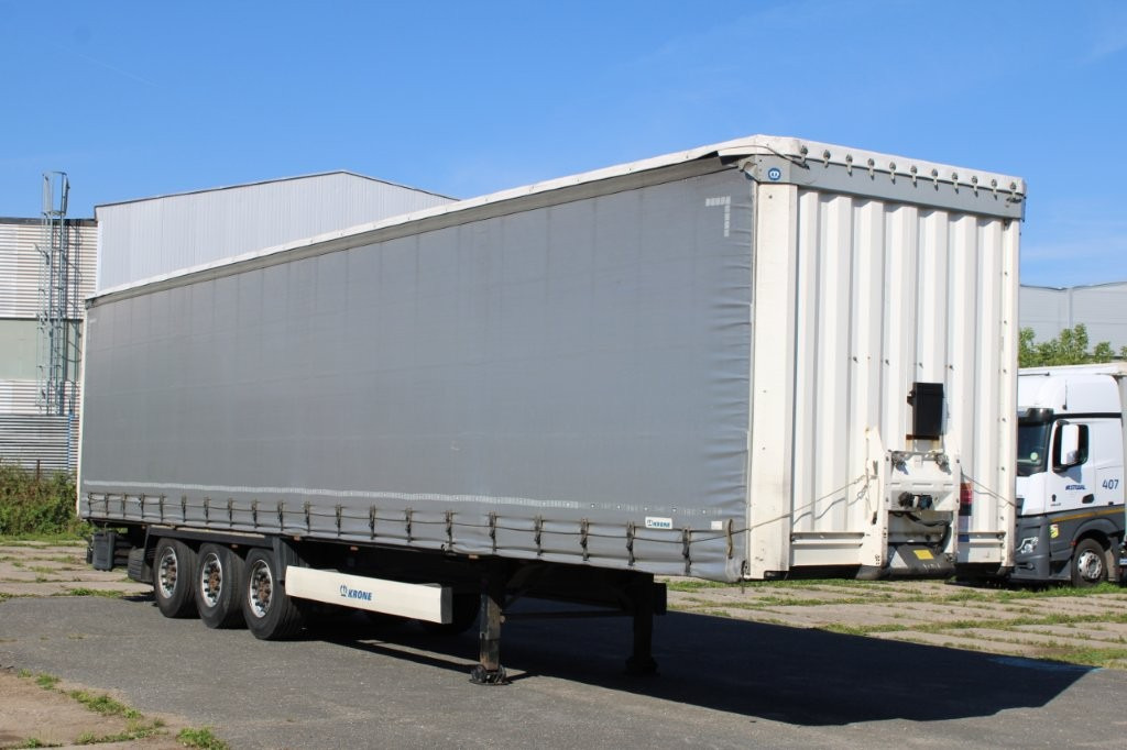 KRONE SD, ZVEDACÍ NÁPRAVA - Planenauflieger: das Bild 1 KRONE SD, ZVEDACÍ NÁPRAVA - Planenauflieger: das Bild 1