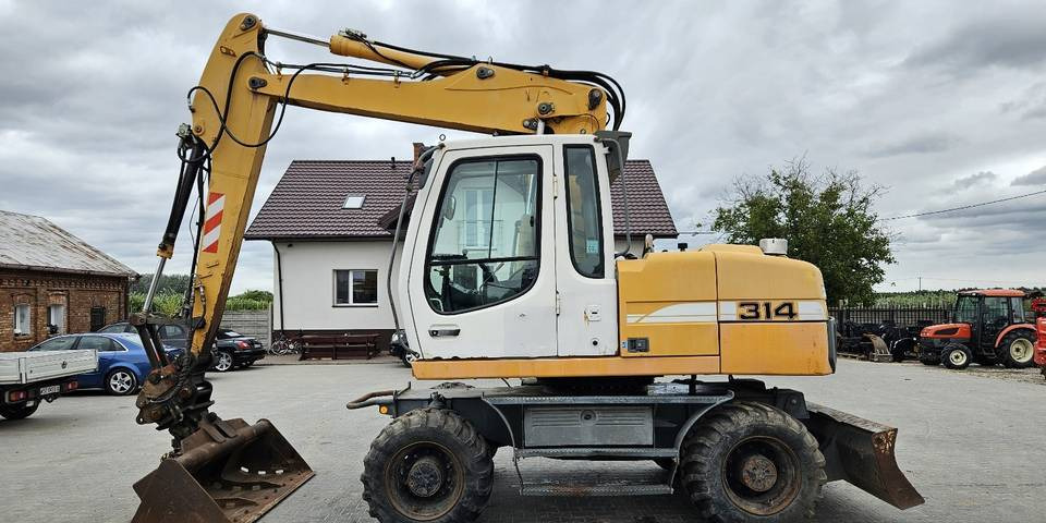 Koparka kołowa Liebherr A314 Litronic 9350 h+ 5 łyżek kołówka - Mobilbagger: das Bild 1 Koparka kołowa Liebherr A314 Litronic 9350 h+ 5 łyżek kołówka - Mobilbagger: das Bild 1