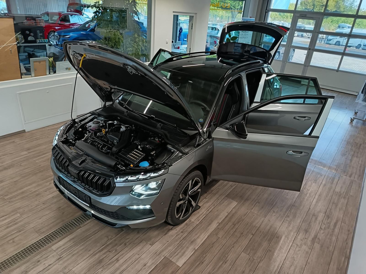 Skoda Kamiq Monte Carlo 1,5 TSI DSG*AHK*PANO*LED*ACC* - SUV/ Geländewagen: das Bild 2 Skoda Kamiq Monte Carlo 1,5 TSI DSG*AHK*PANO*LED*ACC* - SUV/ Geländewagen: das Bild 2