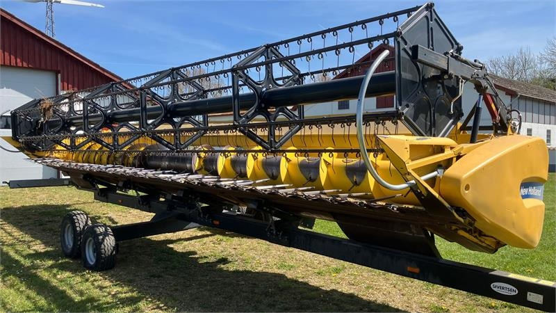 Mähdrescher New Holland CX 8080 SLH med 30 fods Varifeed: das Bild 9