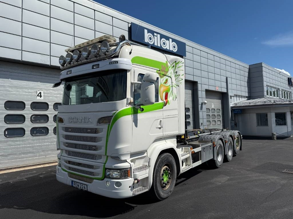 Scania R520LB8X4*4HNB - Abrollkipper: das Bild 1 Scania R520LB8X4*4HNB - Abrollkipper: das Bild 1