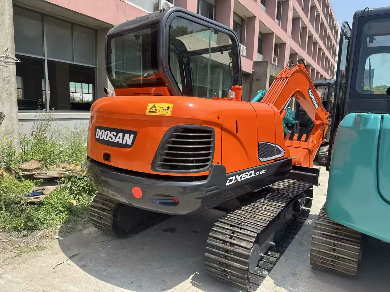 Kettenbagger DOOSAN DX60: das Bild 7 Kettenbagger DOOSAN DX60: das Bild 7