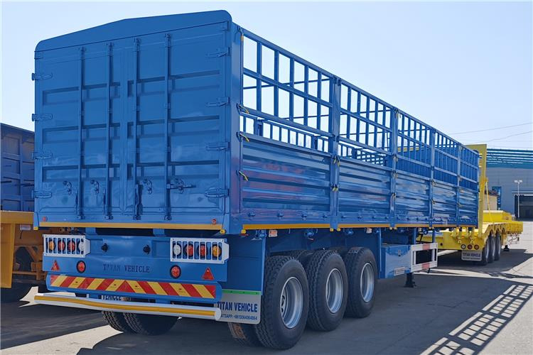 TITAN 60 Ton Fence Cargo Semi Trailer for Sale in Tanzania - Tiertransporter Auflieger: das Bild 1 TITAN 60 Ton Fence Cargo Semi Trailer for Sale in Tanzania - Tiertransporter Auflieger: das Bild 1