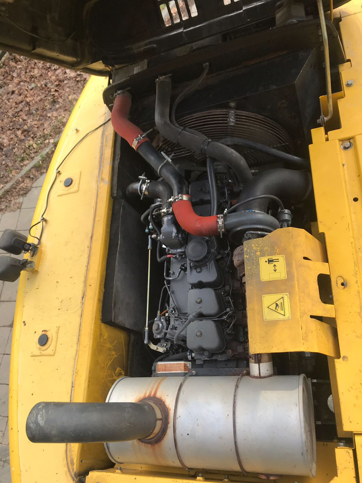 Kettenbagger NEW HOLLAND E 215 B: das Bild 11