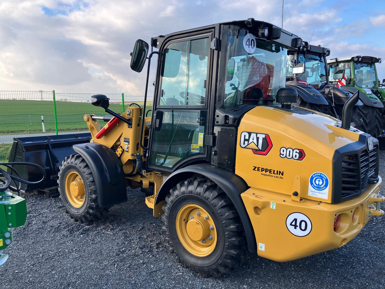 Caterpillar 906 - Radlader: das Bild 2 Caterpillar 906 - Radlader: das Bild 2