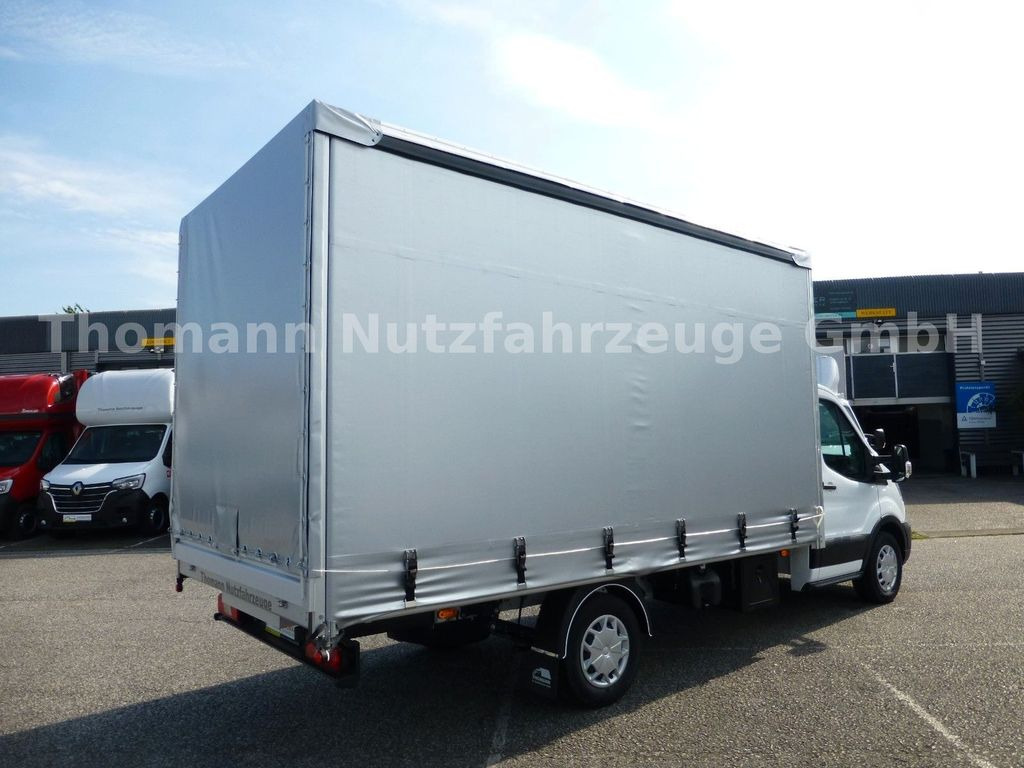 Ford Transit Pritsche Plane 4,25m Klima Temp. DAB Ford Transit Pritsche Plane 4,25m Klima Temp. DAB - Transporter mit Plane: das Bild 4 Ford Transit Pritsche Plane 4,25m Klima Temp. DAB Ford Transit Pritsche Plane 4,25m Klima Temp. DAB - Transporter mit Plane: das Bild 4