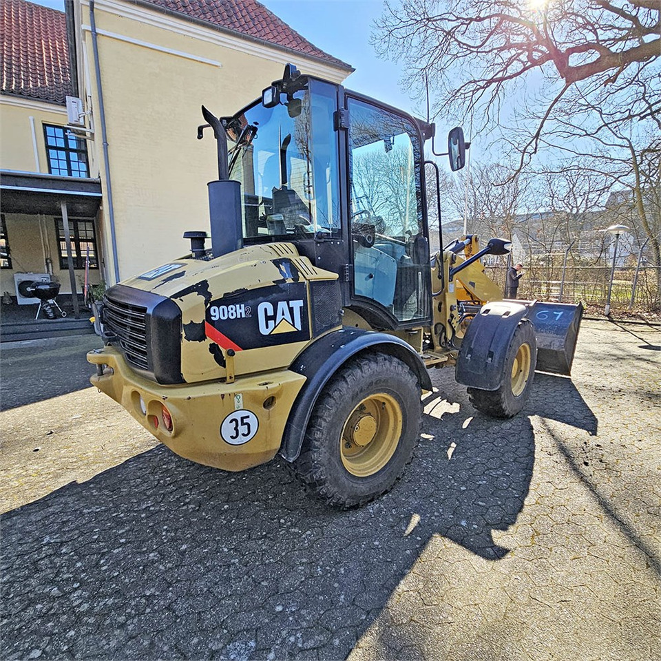 Caterpillar 908 H2 - Radlader: das Bild 4 Caterpillar 908 H2 - Radlader: das Bild 4